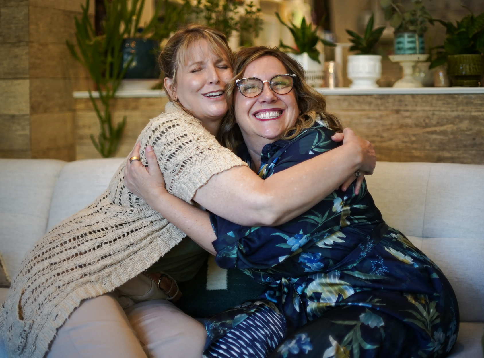 Loren and Paula hugging in Franny's Farmacy Raleigh