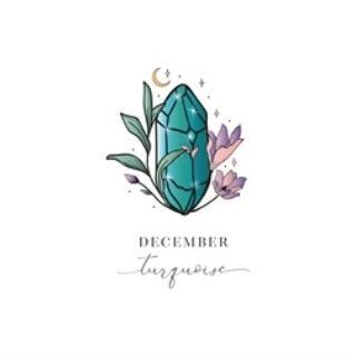 Een turquoise kristallen kristal met bladeren en bloemen boven het woord "december" in sierletters.