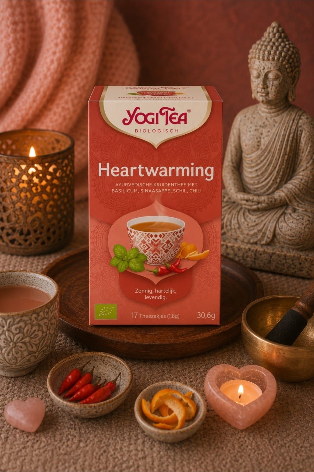 Yogi Tea: Een hartverwarmende doos met kaneel en kruiden, brandende kaarsen, kristallen en een Boeddhabeeldje