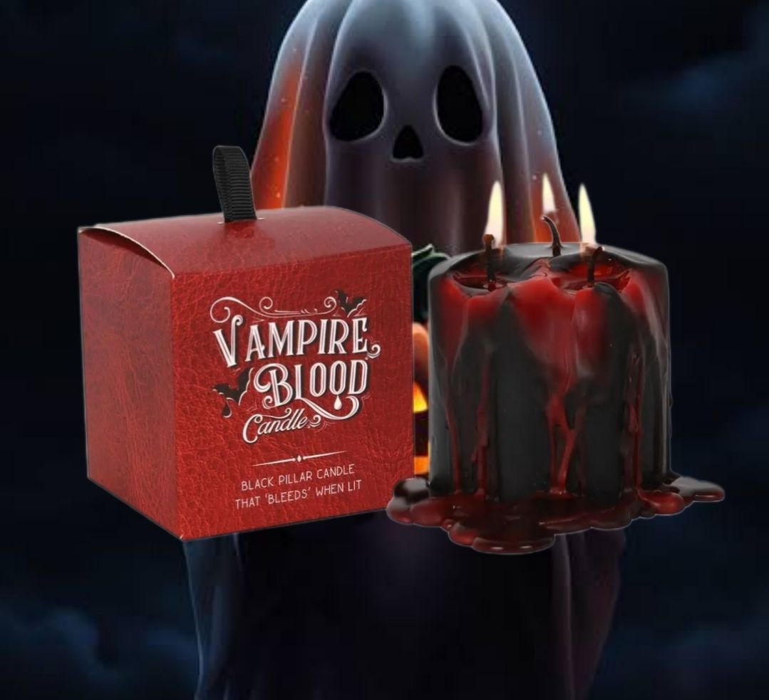 Halloween-vampierbloedkaars met rode wasdruppels naast een rode doos met een spookvormige deksel.