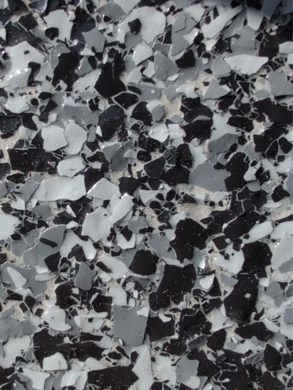 Black, white, and gray speckled terrazzo surface texture