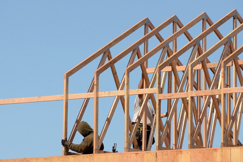2 Man Finishing the Structure of the House — Builder in Lowmead, QLD