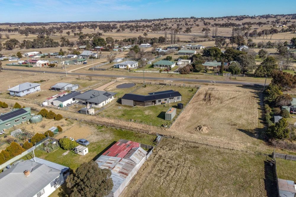 A high-angle shot of an urban residential area during the day in Deepwater — Home Builder in Deepwater, QLD