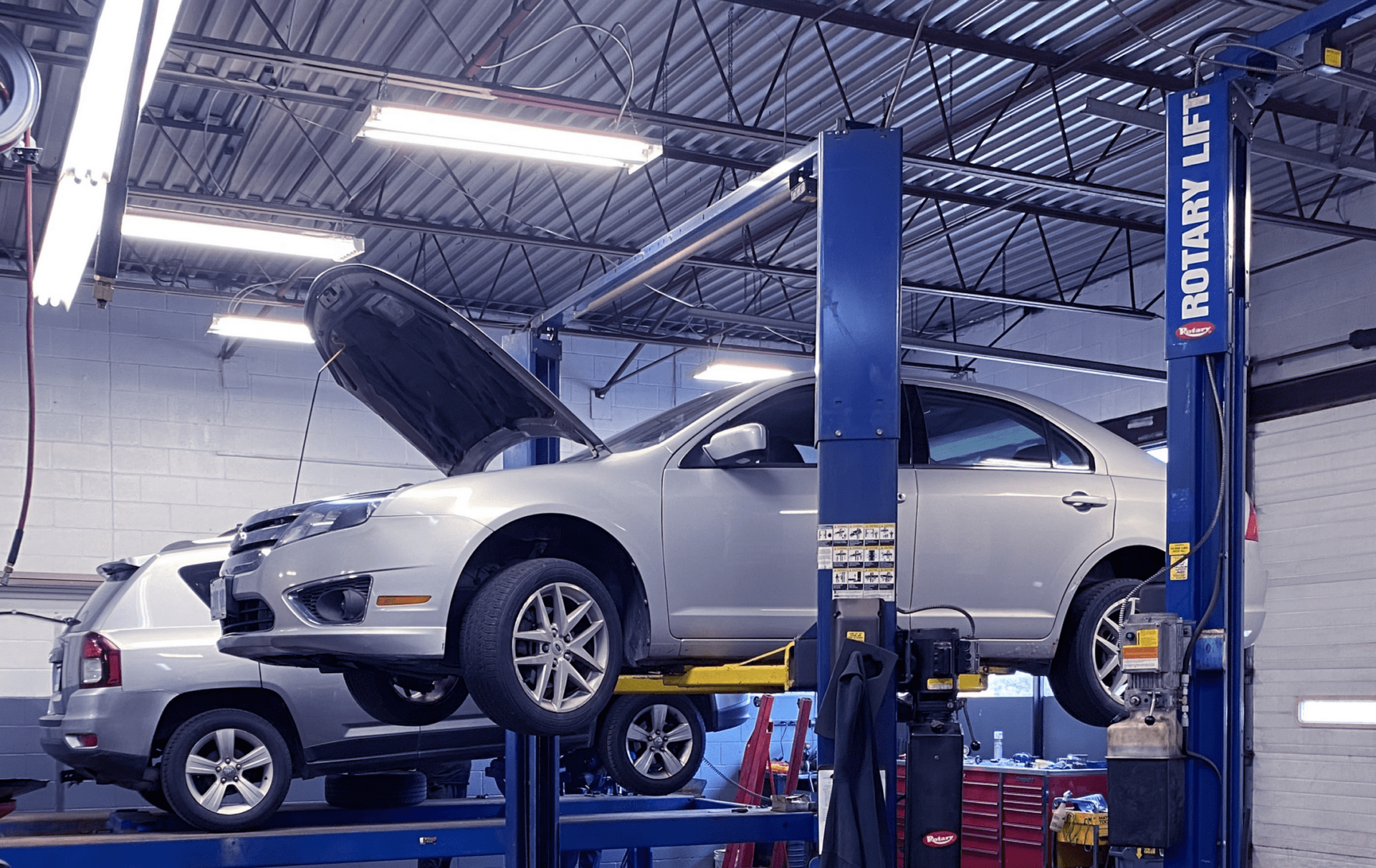 Car on Lift at Columbia Auto Group - Waterloo Auto Repair