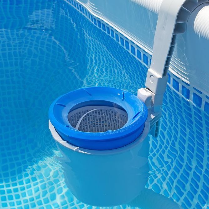 A Blue Skimmer is Attached to the Side of a Swimming Pool — Fannie Bay Pool Shop in Winnellie, NT