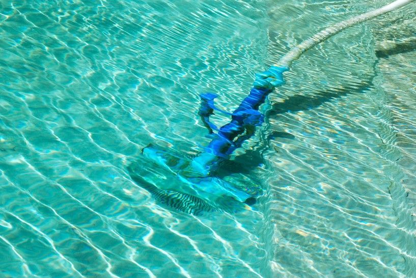 A Blue Vacuum Cleaner is Floating in a Swimming Pool — Fannie Bay Pool Shop in The Narrows, NT
