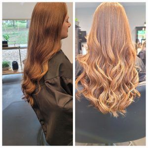 Before and after photos of long, wavy auburn hair in a salon setting.