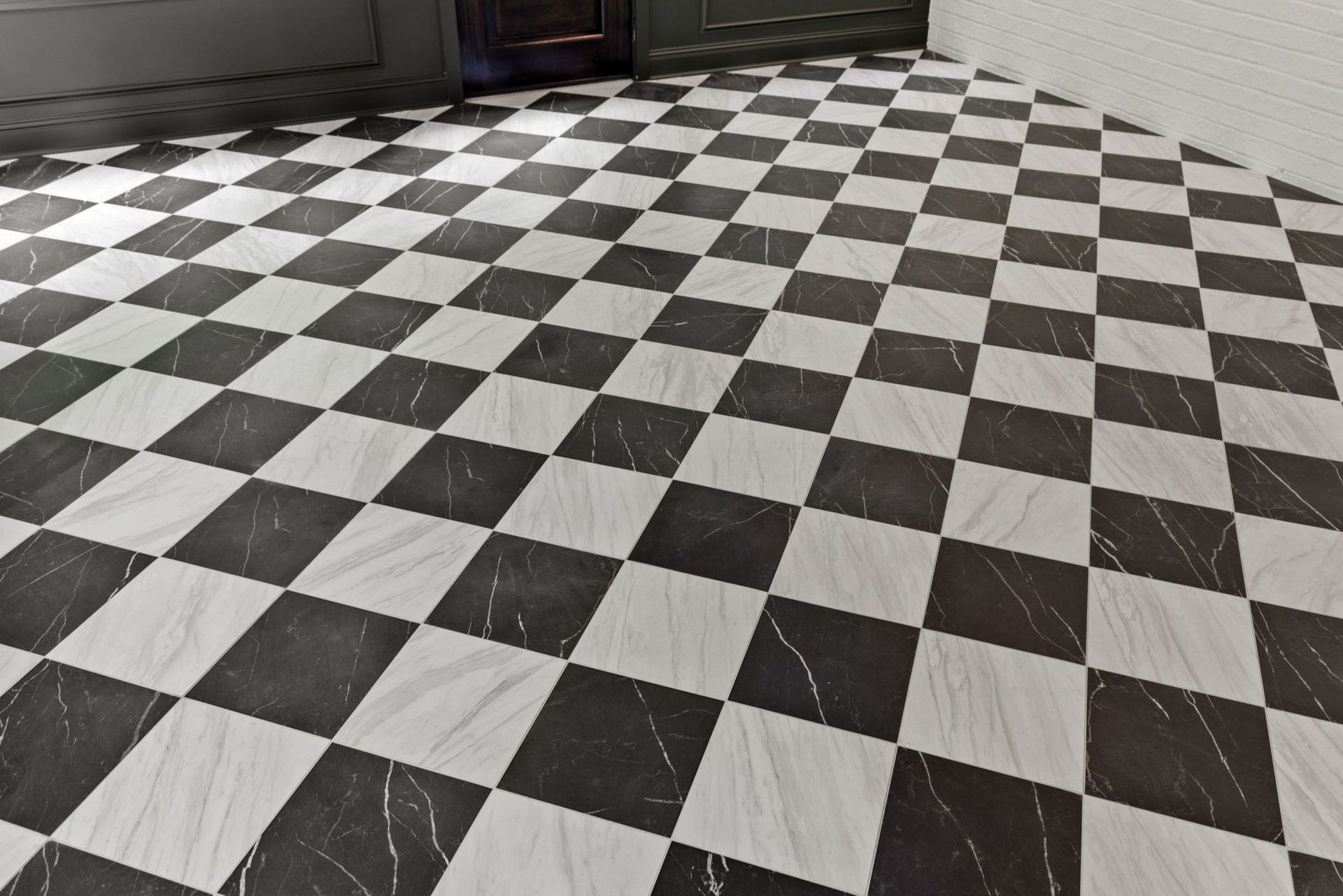 A black and white checkered floor in a room