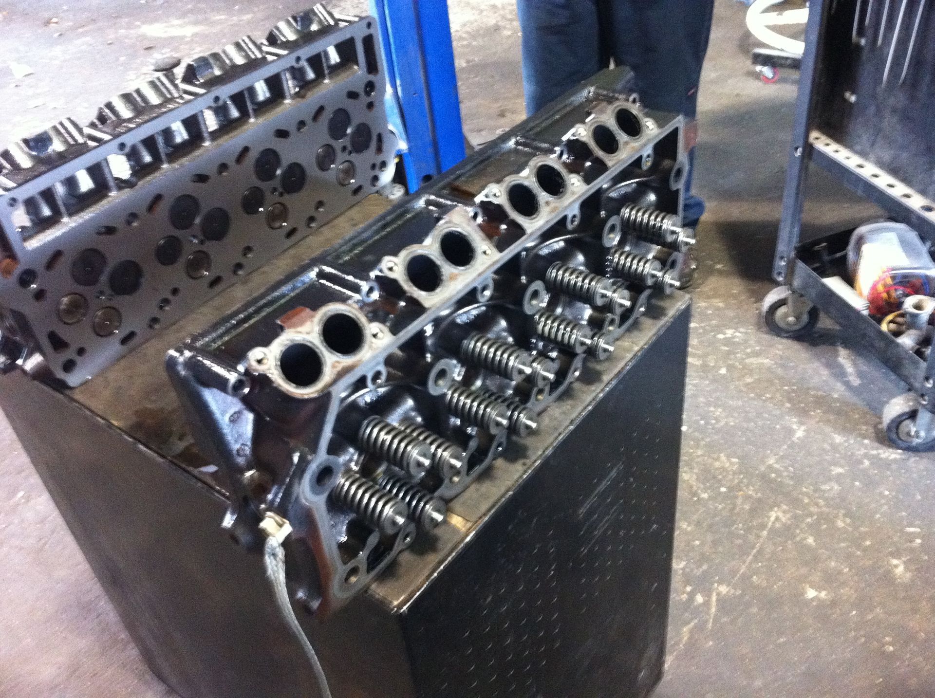 A close up of a cylinder head of a car engine