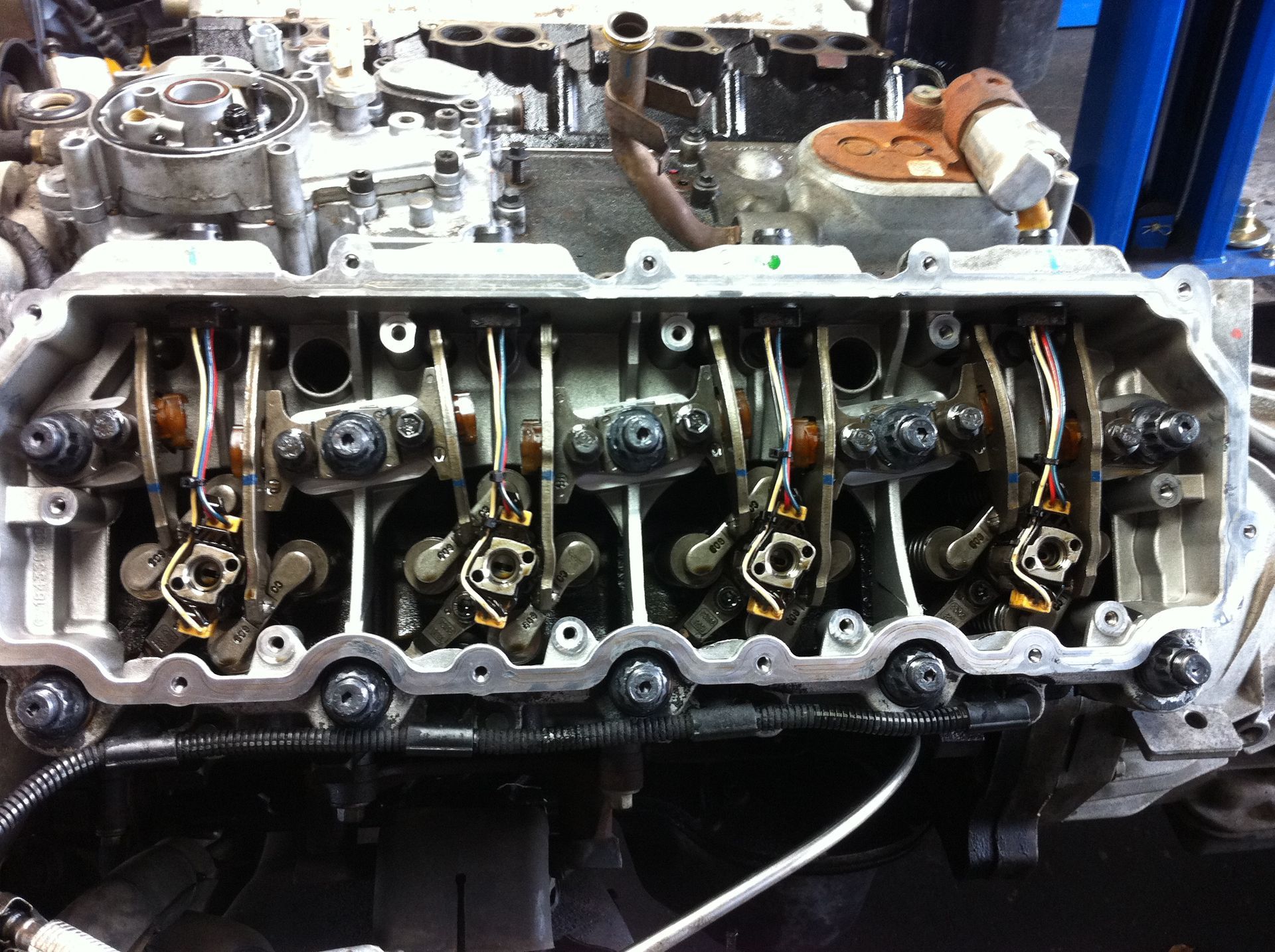 A close up of the inside of a car engine