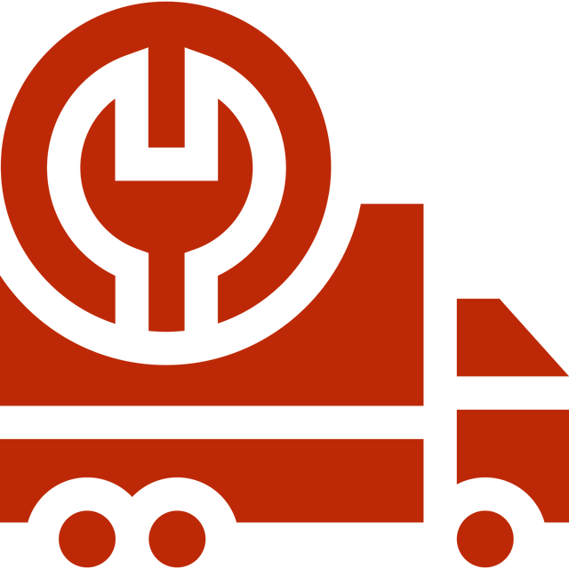 A red truck with a white wrench on top of it