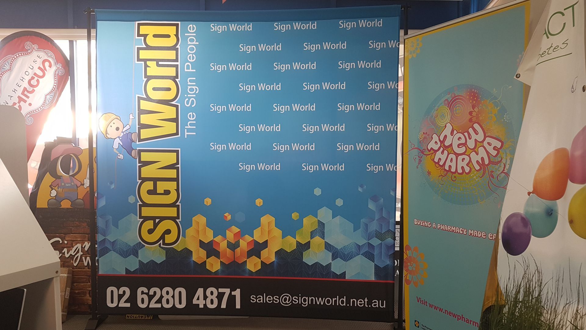 A sign that says sign world on it — Signworld In Mitchell, ACT