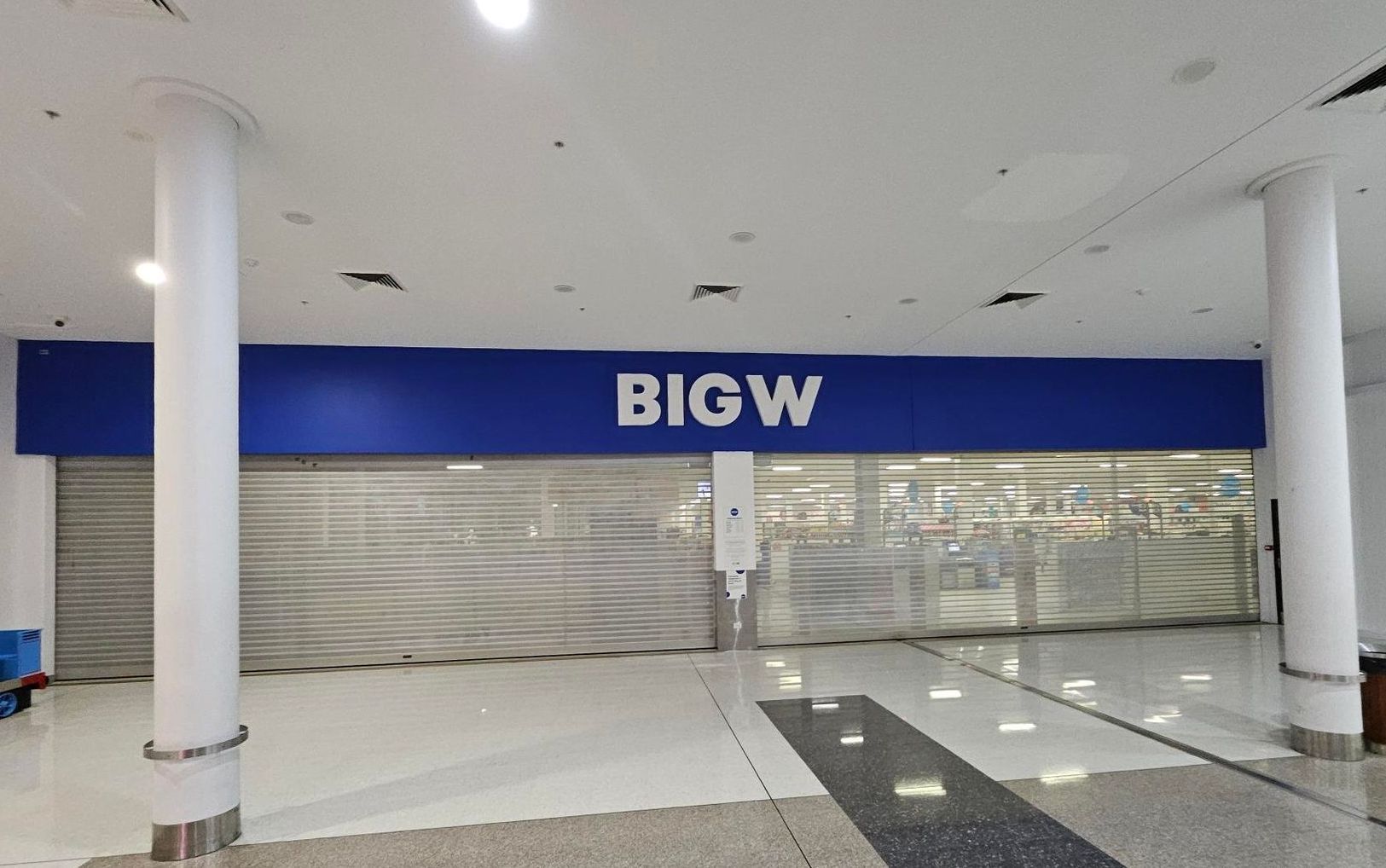 A bigw store is closed in a shopping mall — Signworld In Mitchell, ACT