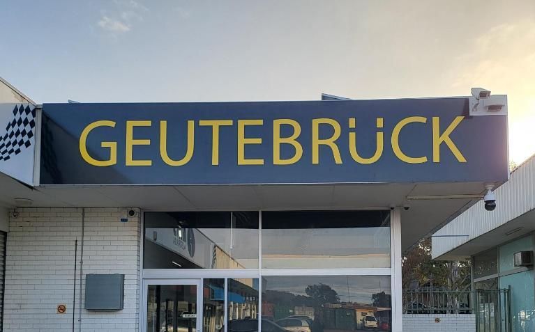 A Building With a Sign That Says Geutebruck on It — Signworld In Mitchell, ACT