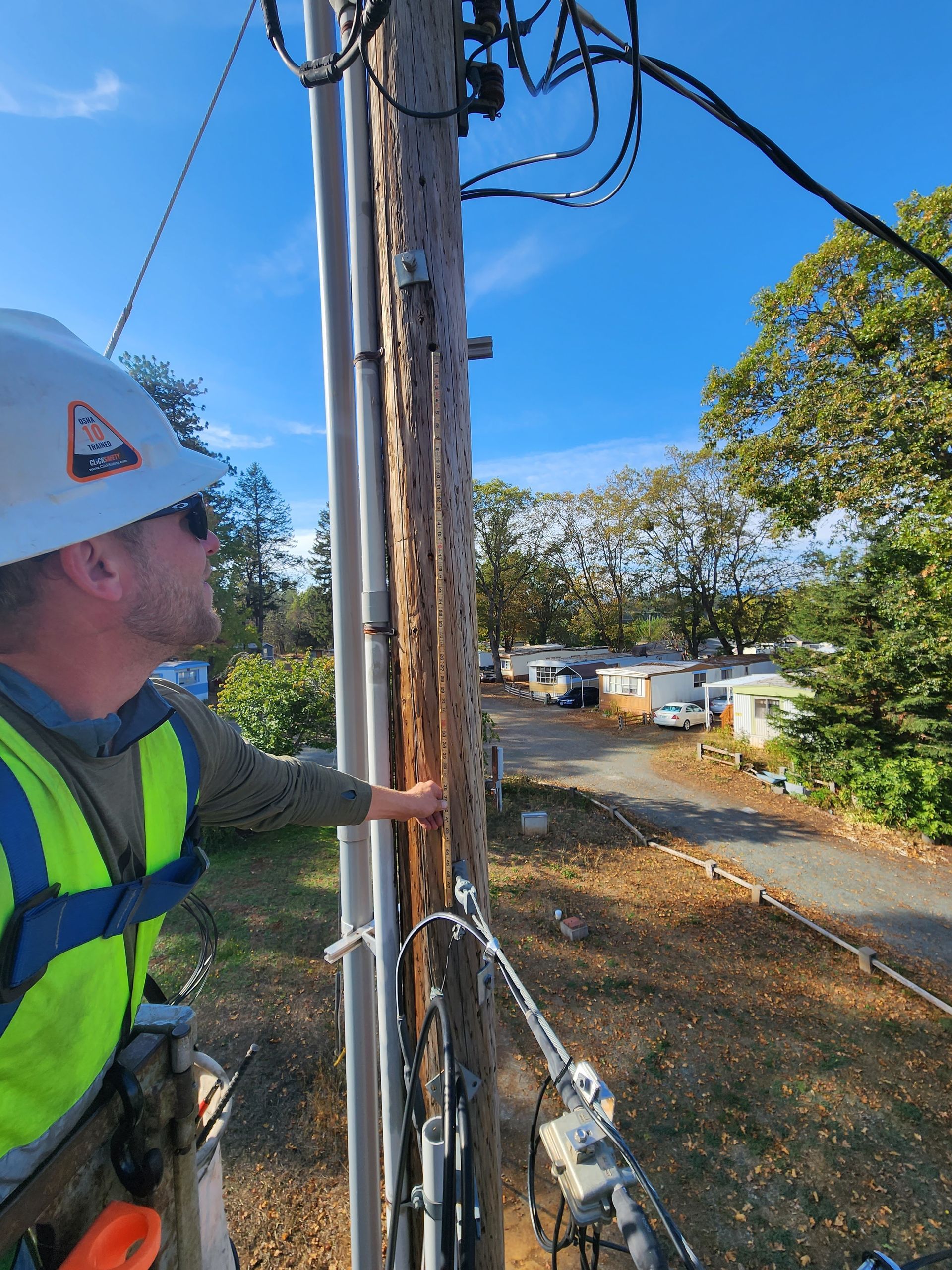 Grover Construction LLC team performing pole inspections in Washington state