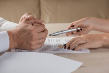 Female lawyer talking to a client