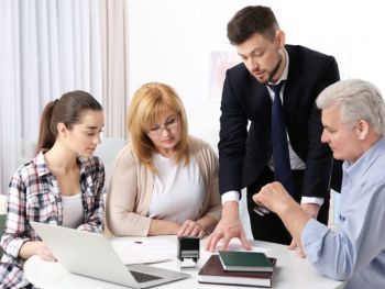 Attorney talking to clients