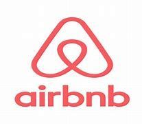 Airbnb logo in red with stylized heart-shaped symbol above the word “airbnb”