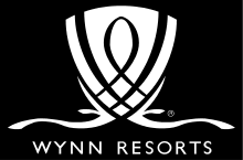 Wynn Resorts logo in white on a black background with stylized abstract emblem and text.