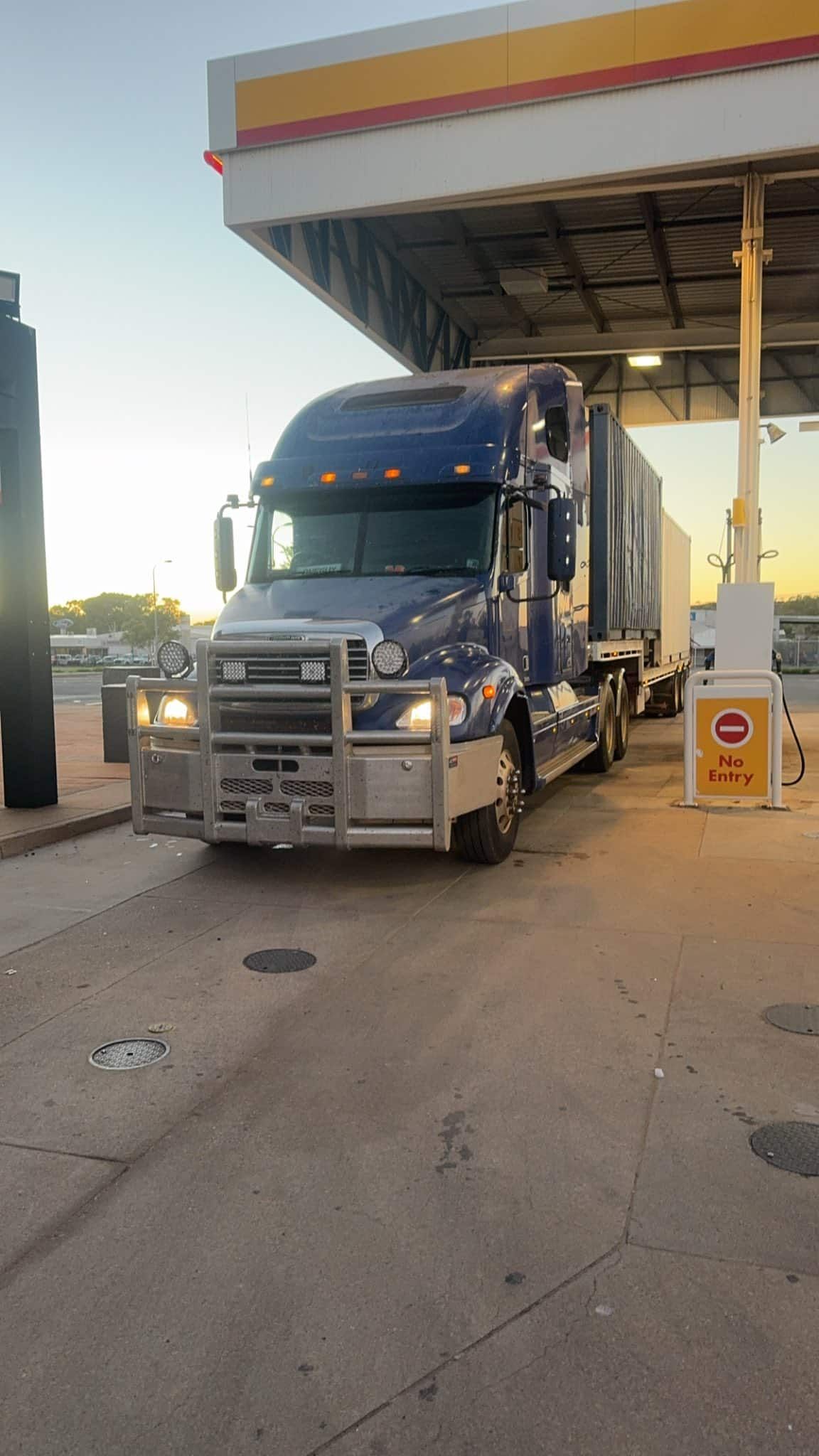 A Blue Semi Truck is Parked at a Gas Station — Cohen’s Towing & 4WD Recoveries In Winnellie, NT