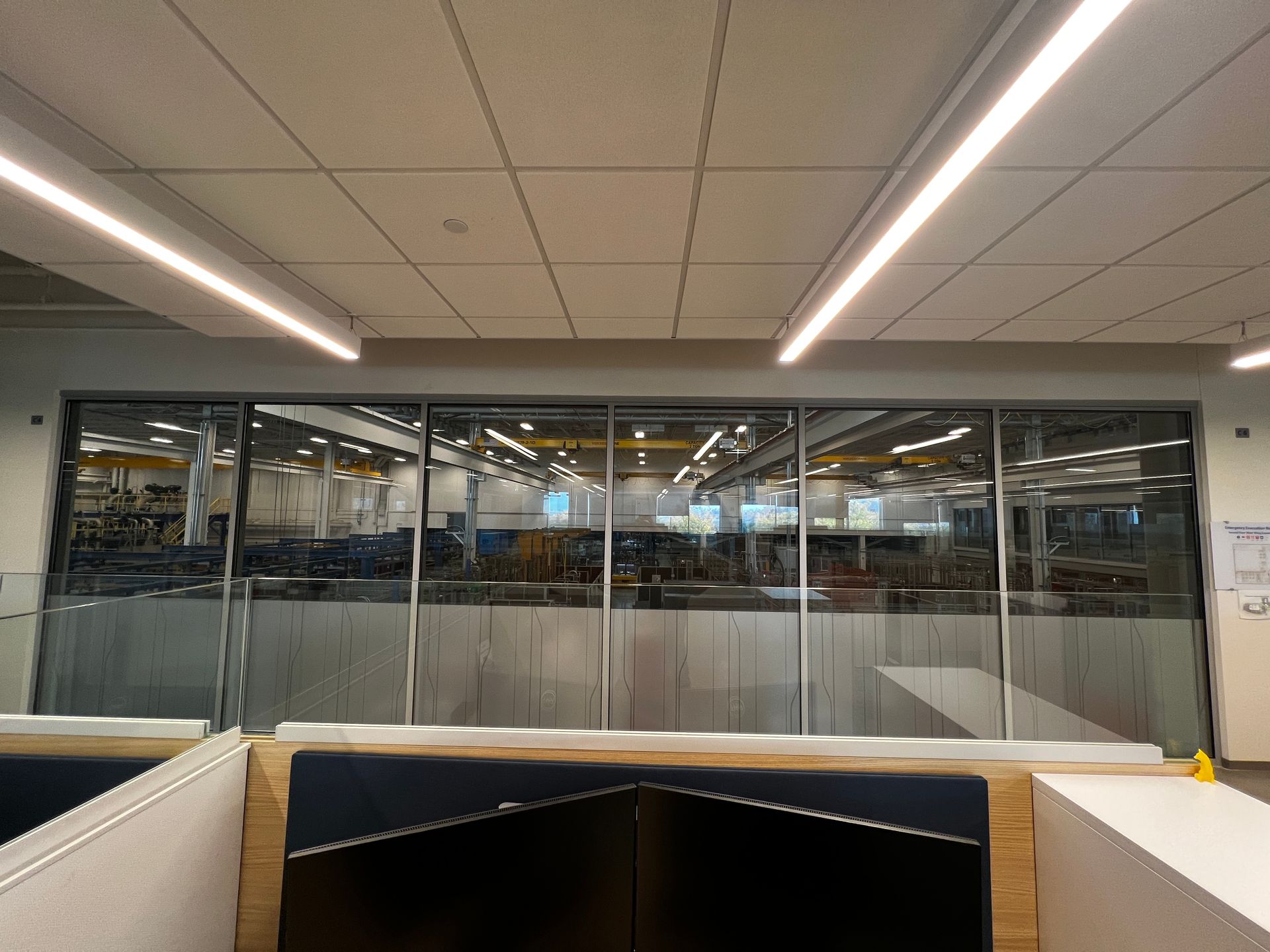 A room with a lot of windows and a ceiling.