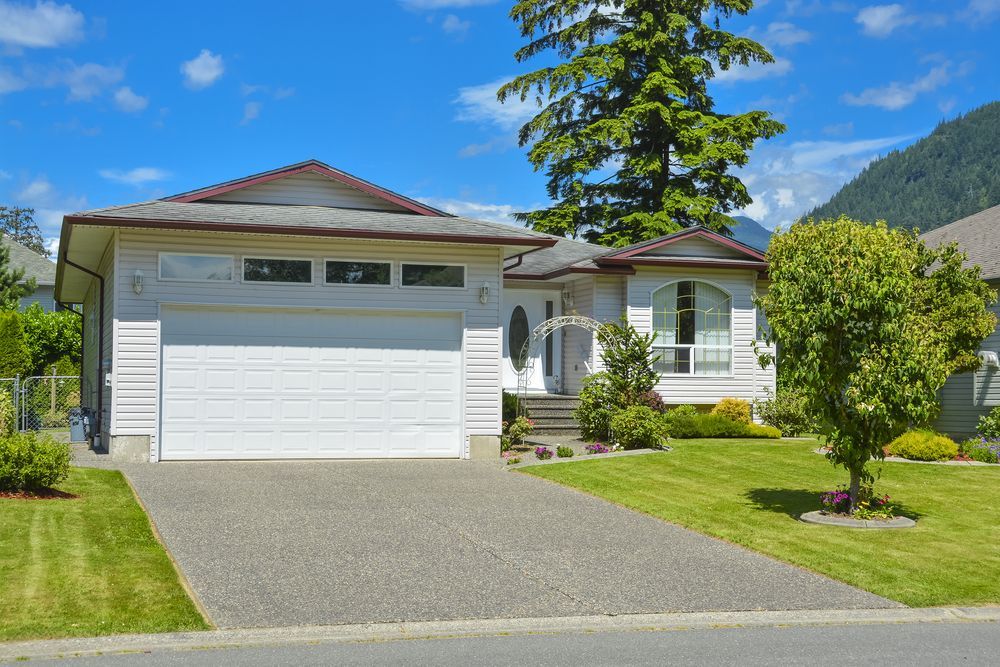 White House With Attached Garage — G.N Painting and Decorating in Bonny Hills, NSW