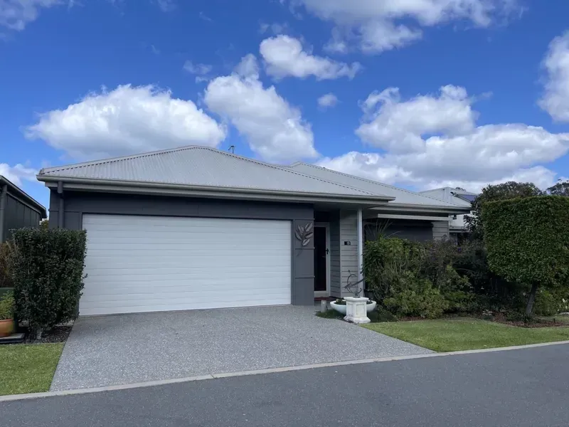 Gray House With a Two-car Garage, Grey Roof — G.N Painting and Decorating in Port Macquarie, NSW