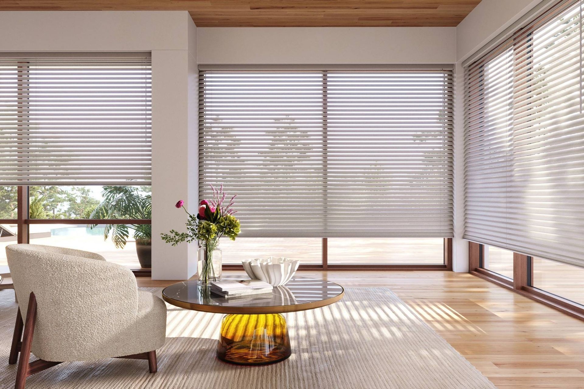 Hunter Douglas Aria™ Soft Blinds on large windows in a contemporary living room.