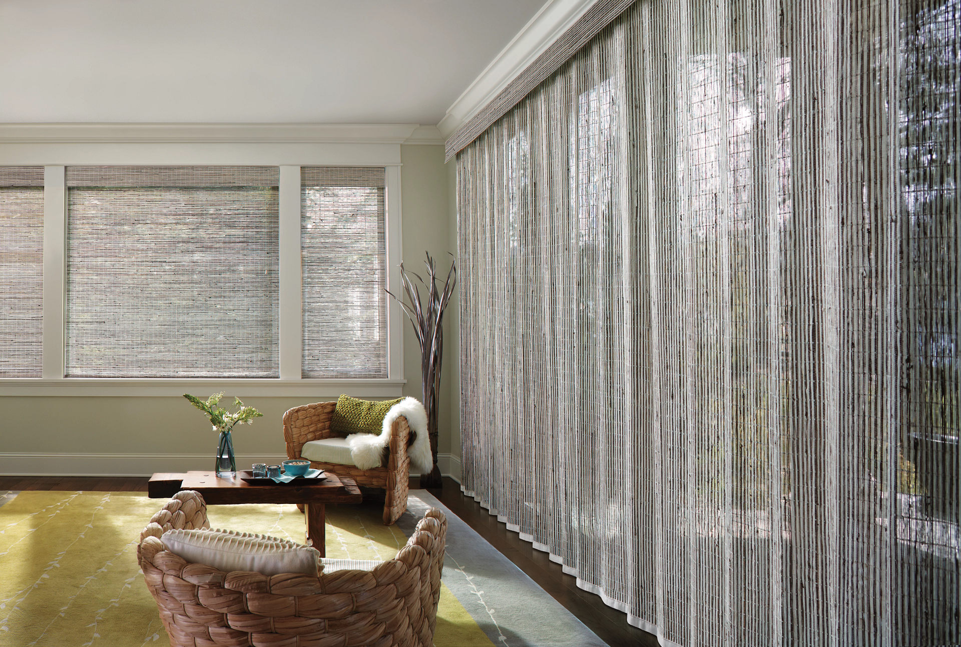 Provenance® Woven Wood Shades in Roman and vertical styles.