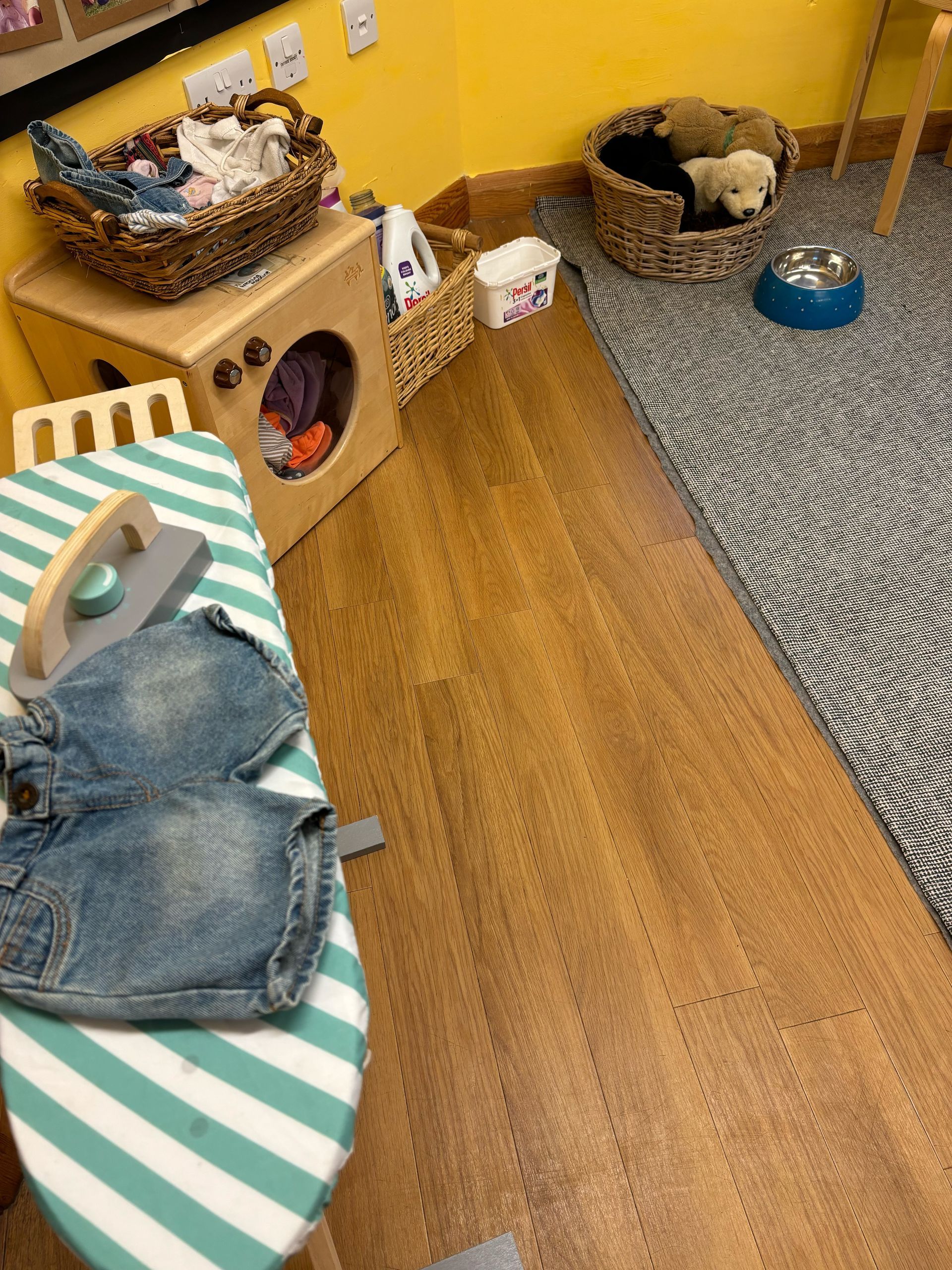 A striped table with a pair of jeans on it