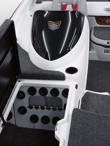 White boat console with black windshield, cup holders, and rod holders.