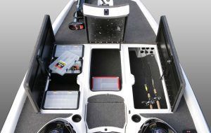 Overhead view of a fishing boat deck with storage compartments and a center console.