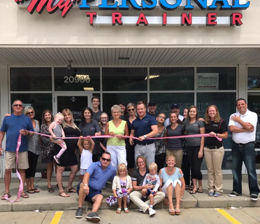 A Group of People are Standing in Front of a Gymr Store | Uniontown, OH | My Personal Trainer