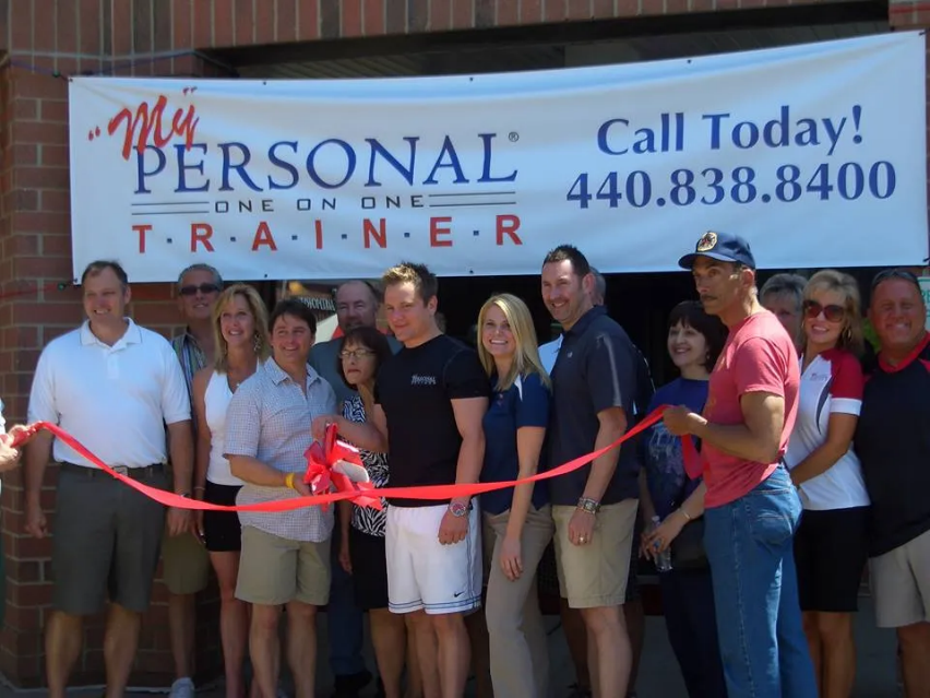 A Group of People are Standing in Front of a Personal Trainer Store | Uniontown, OH | My Personal Trainer