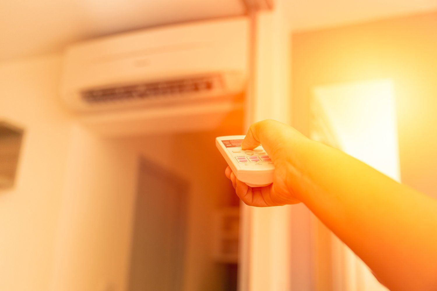 Hand Pointing To Air Conditioner — Beech Grove, IN — Preferred Mechanical Services