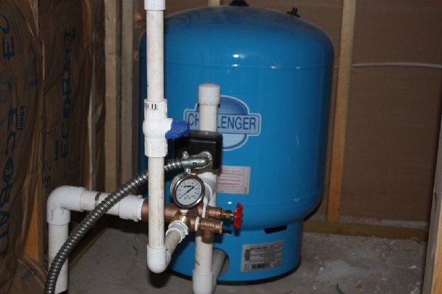 Close-up of a water well, showcasing professional water well service and clean well components.