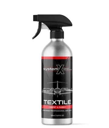 A spray bottle of textile carpet and fabric cleaner.