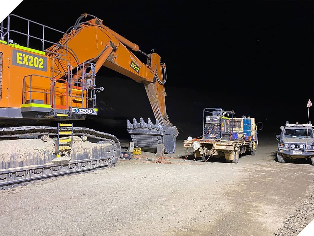 A Large Excavator With the Number Ex202 on It — North Queensland Hard Facing (NQHF) In Fredericksfield, QLD