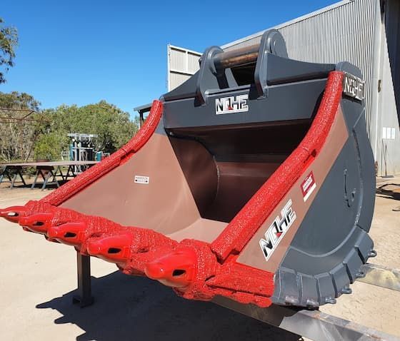 A Large Bucket With the Word Nbc on It — North Queensland Hard Facing (NQHF) In Fredericksfield, QLD