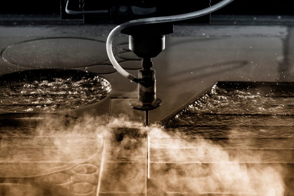 Waterjet Cutting Machine in Operation — North Queensland Hard Facing (NQHF) In Fredericksfield, QLD