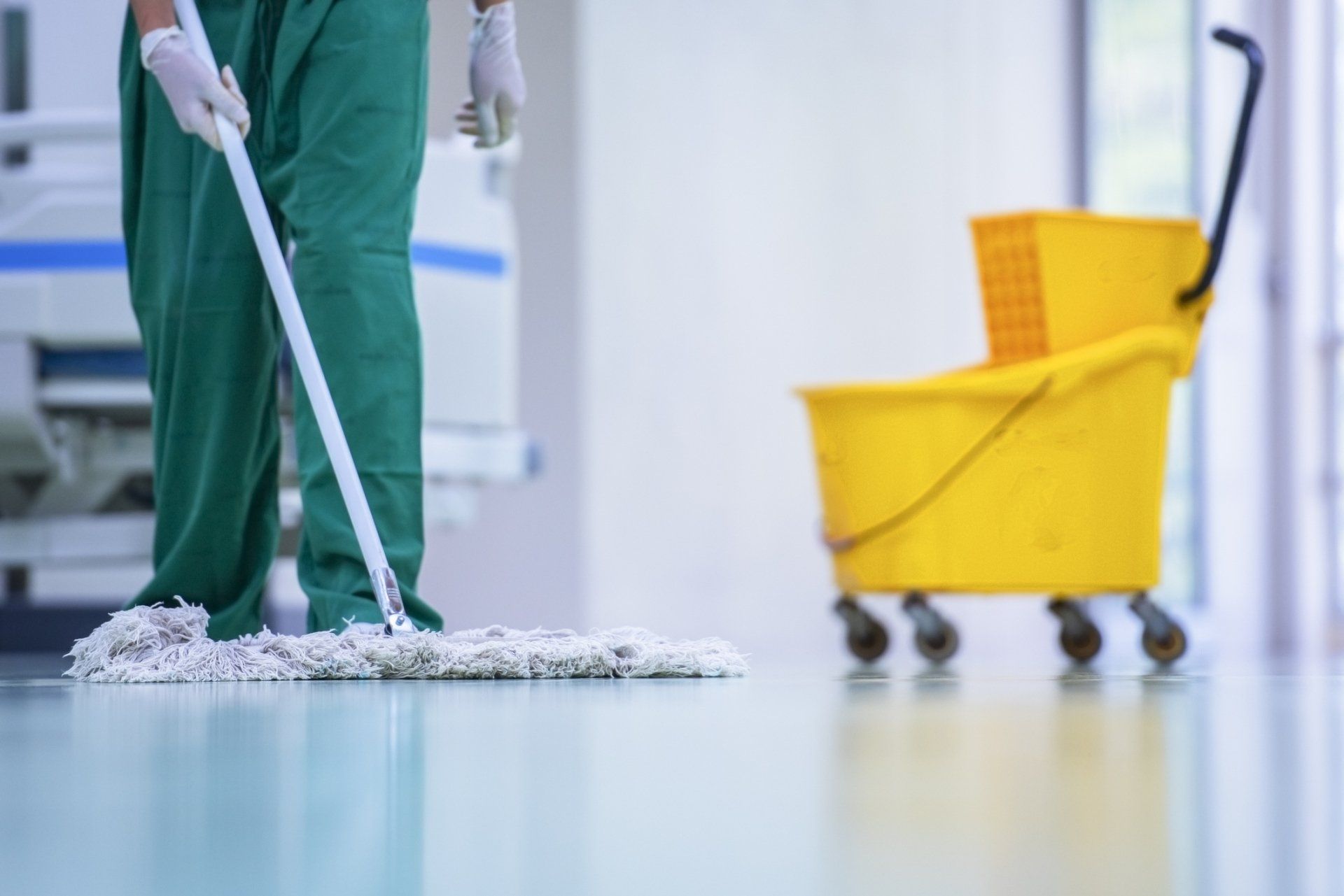 A Janitor Mopping The Floor - Dover, OH - Rosmary's Cleaning Service A Janitor Mopping The Floor - Dover, OH - Rosmary's Cleaning Service