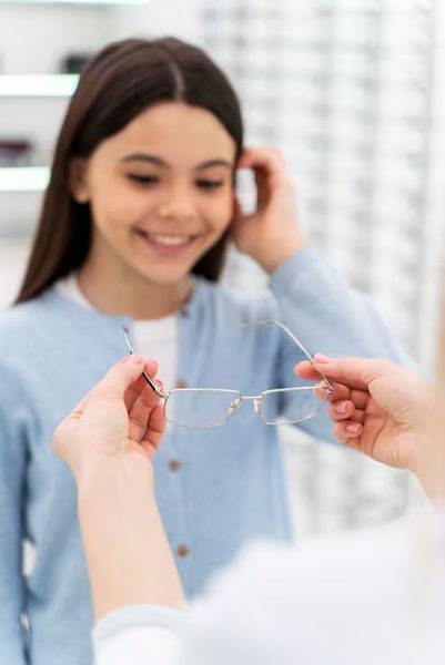 Child receiving eye exam