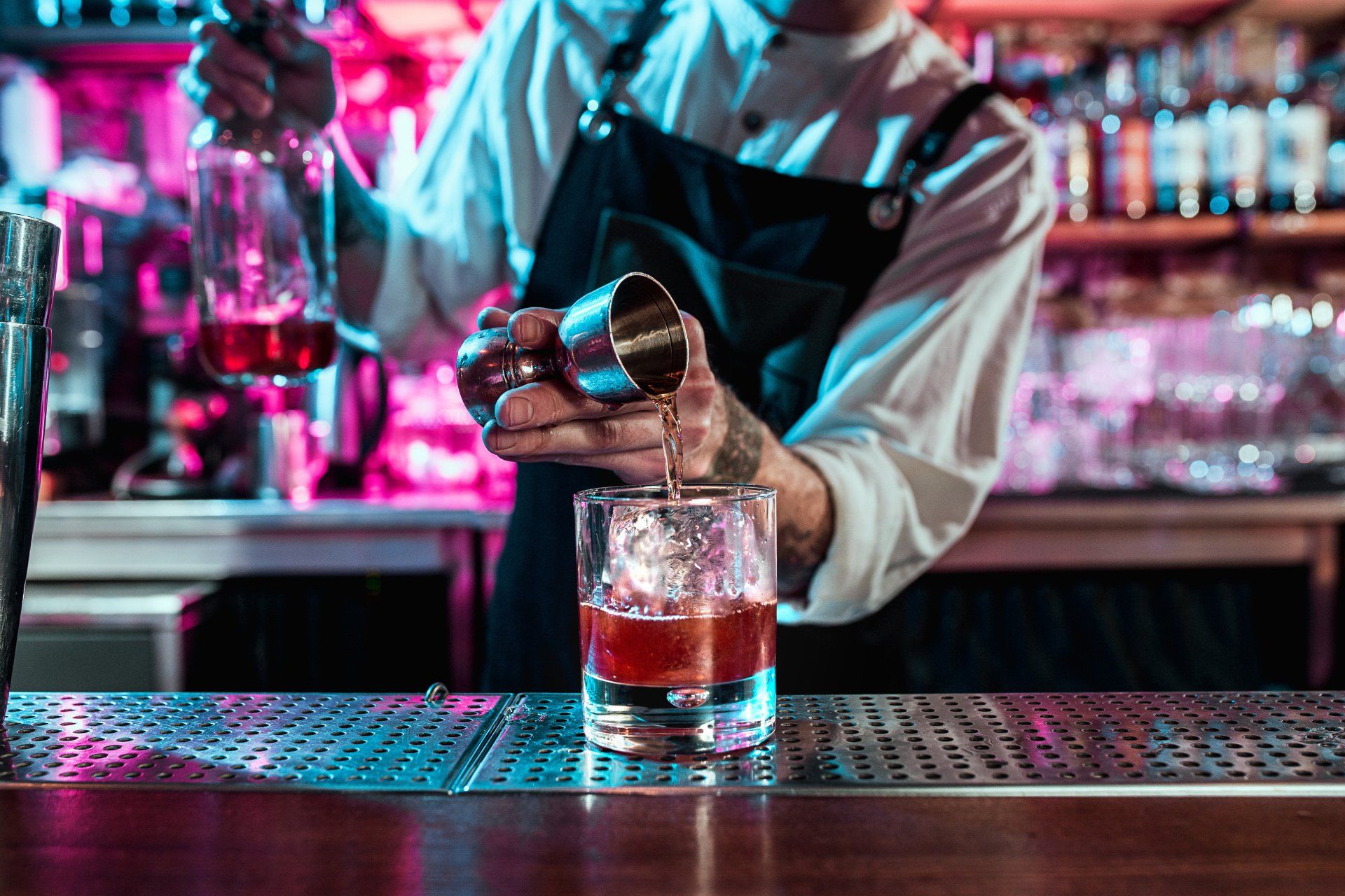 Bartender making cocktail