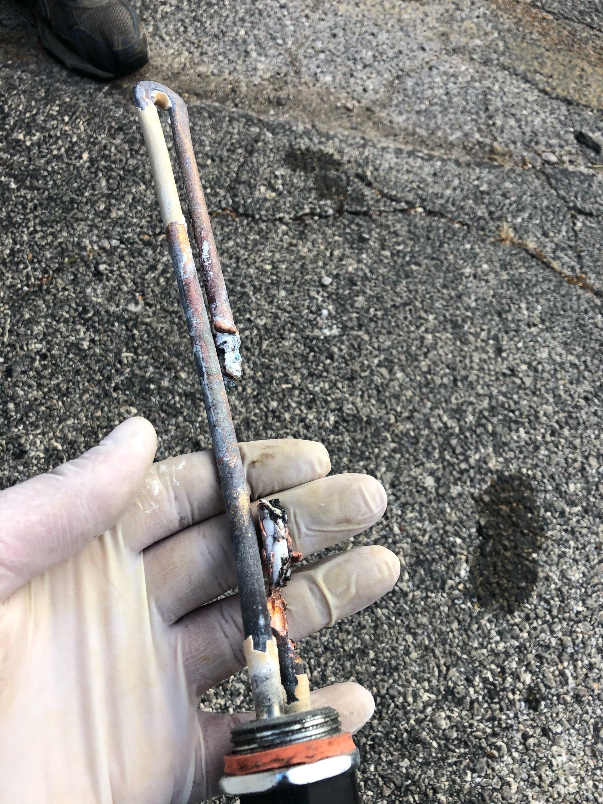 corroded, broken water heater element