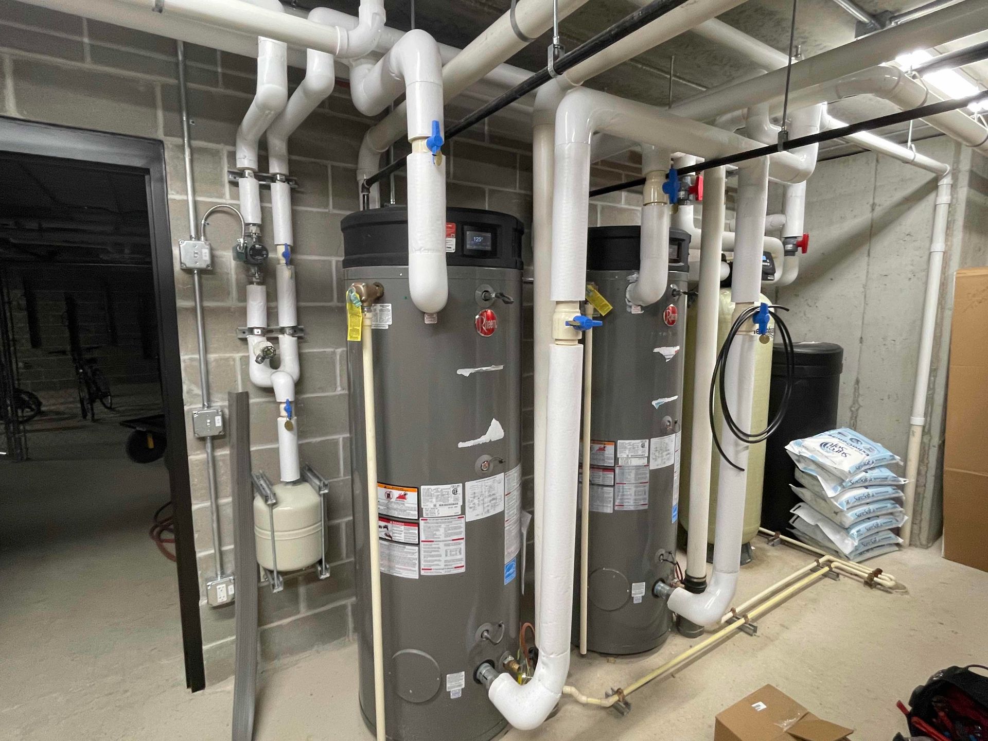 Replacement of Faulty Blower Assembly on Rheem Triton GHE100SU-200 at an apartment complex in Madison, Wisconsin