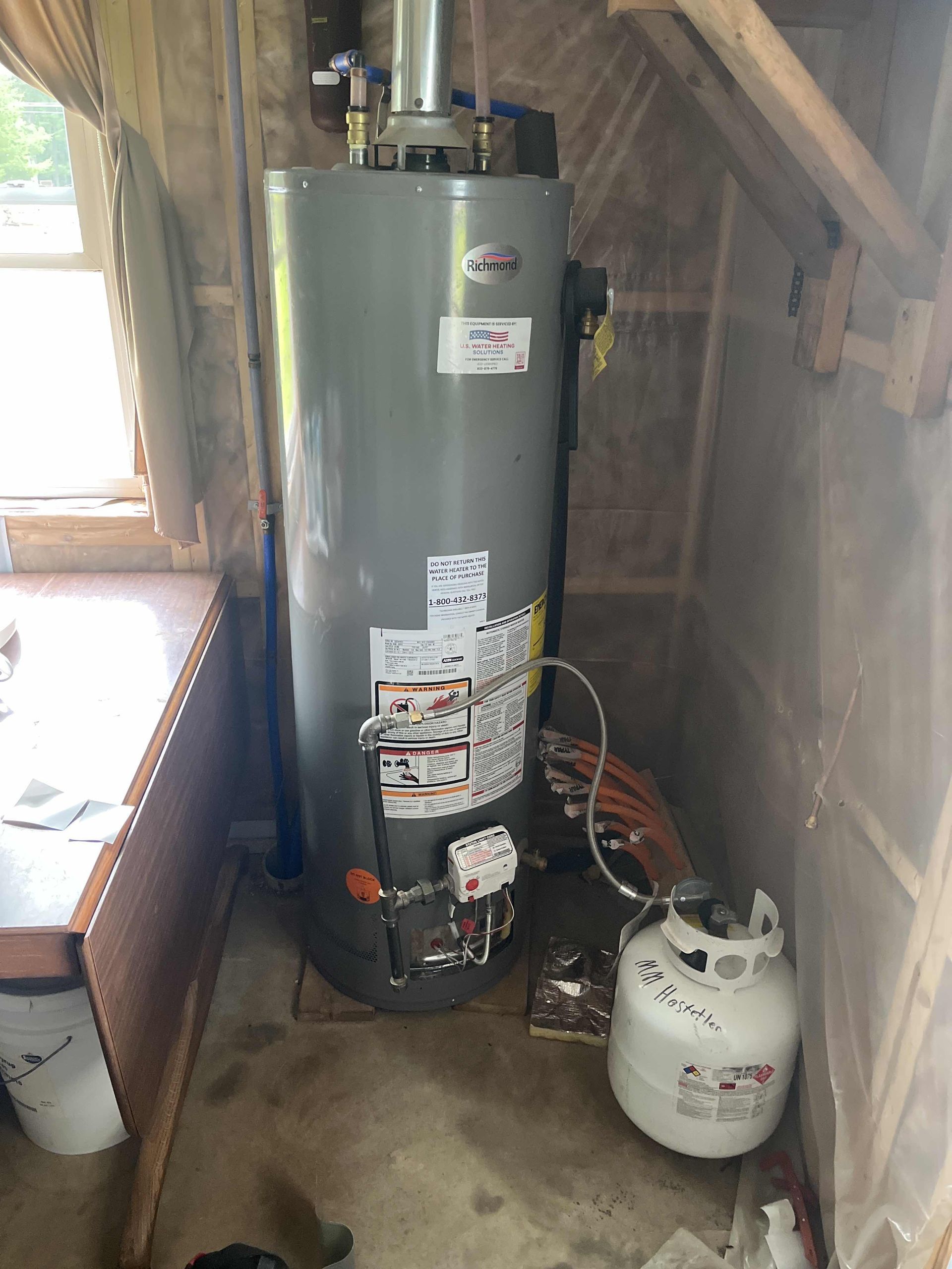 Richmond LP water heater model 6G40-32PF3 installed in customer's attic in Camp Douglas, WI