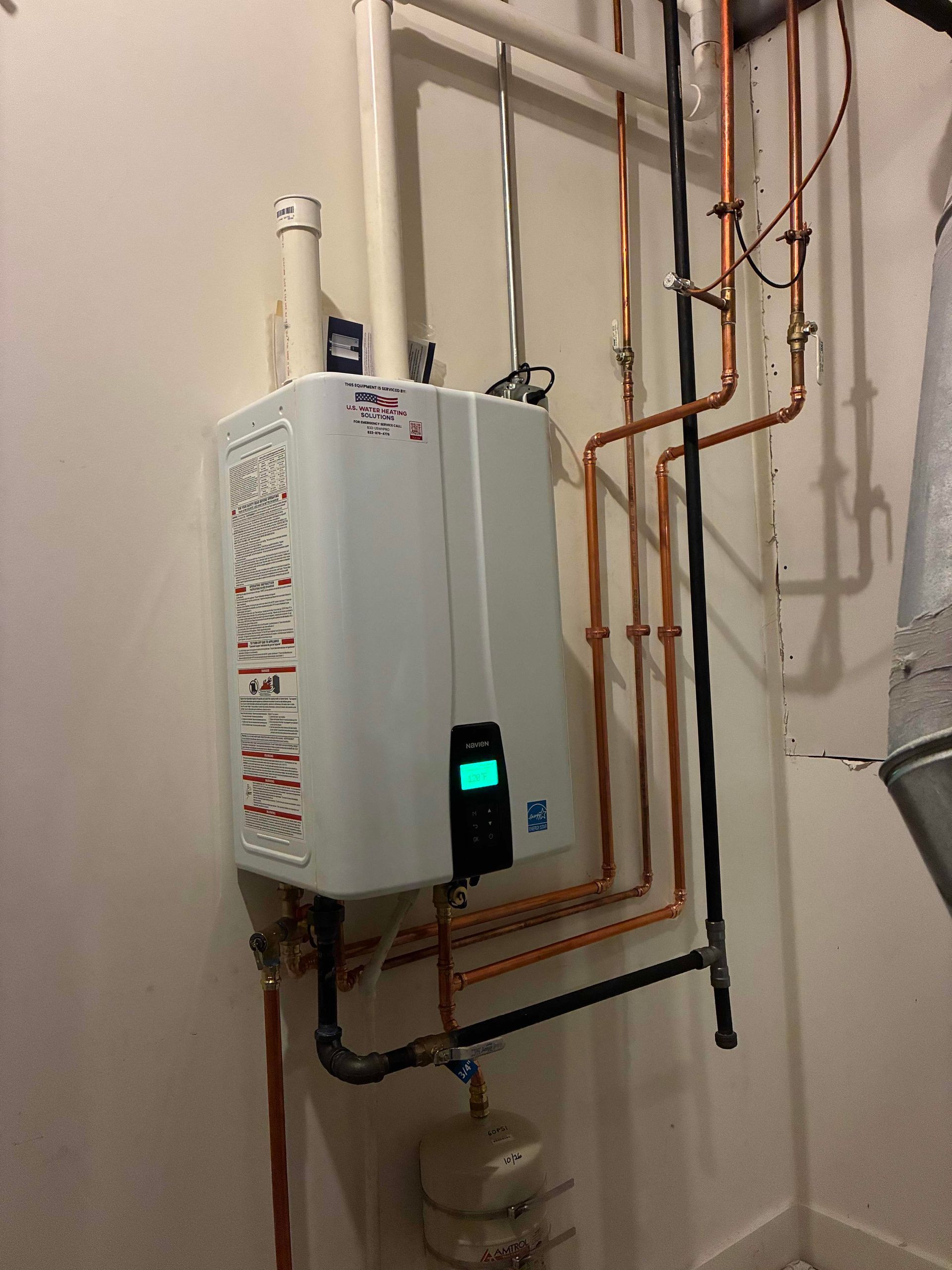 After the replacement of a GDHE-50 A.O. Smith water heater with a Navien NPE240A Tankless Water Heater in Downers Grove, Illinois