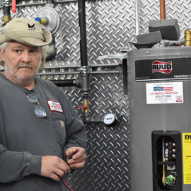 Headshot of Senior Water Heater Repair Technician and Trainer: Kirk W. (Chicago, Illinois)