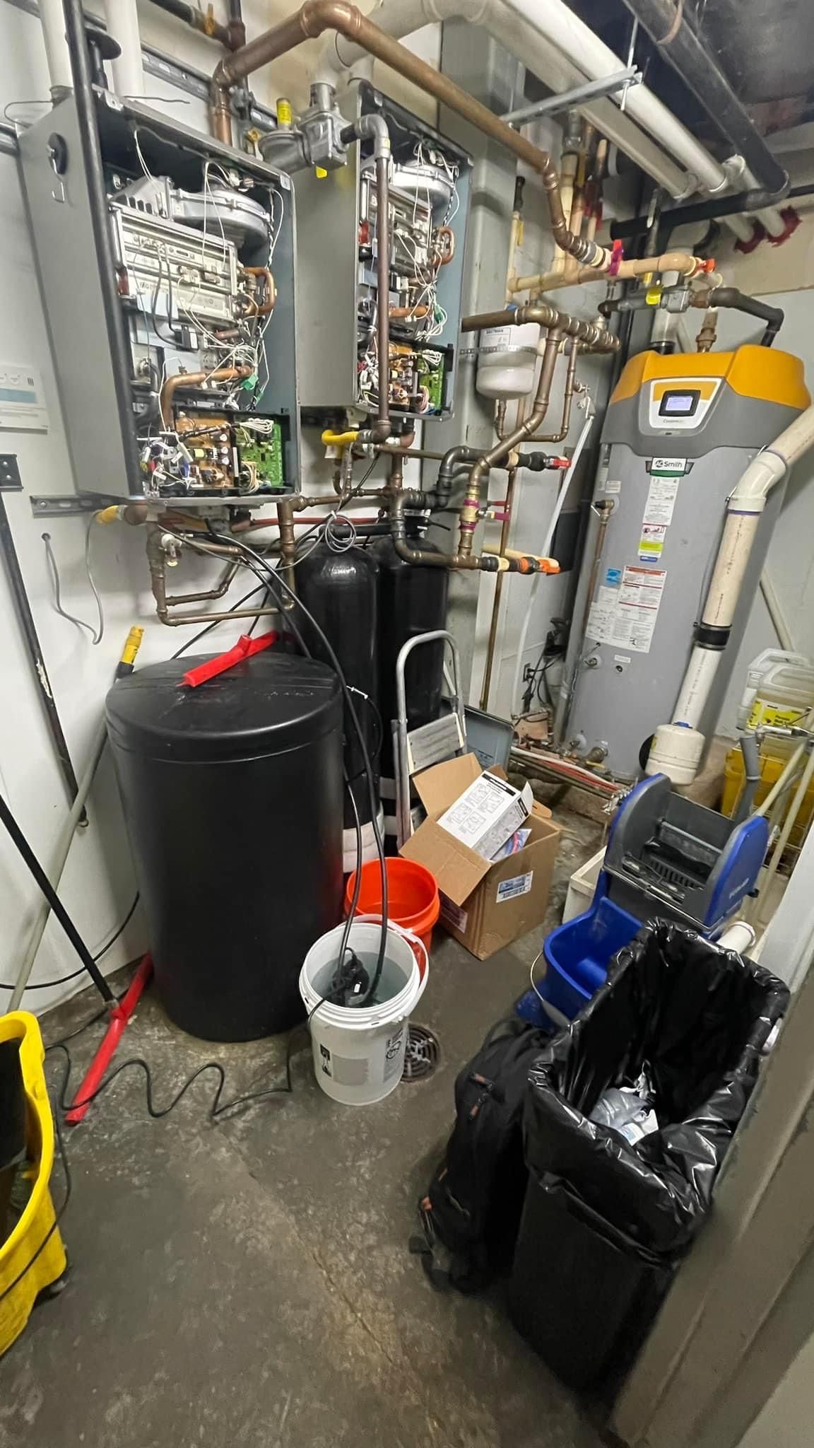 Commercial preventative maintenance A.O. Smith BTH, two tankless water heaters, behind the scenes of water heater maintenance