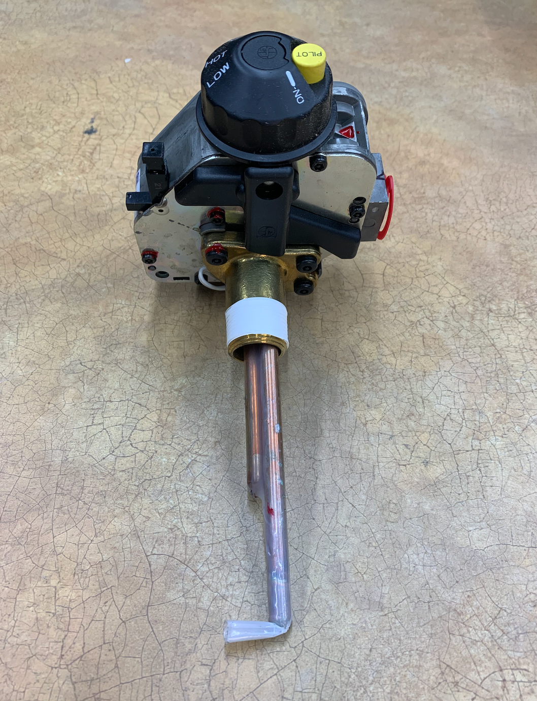 Brand new gas valve with extended plastic sleeve on thermal well